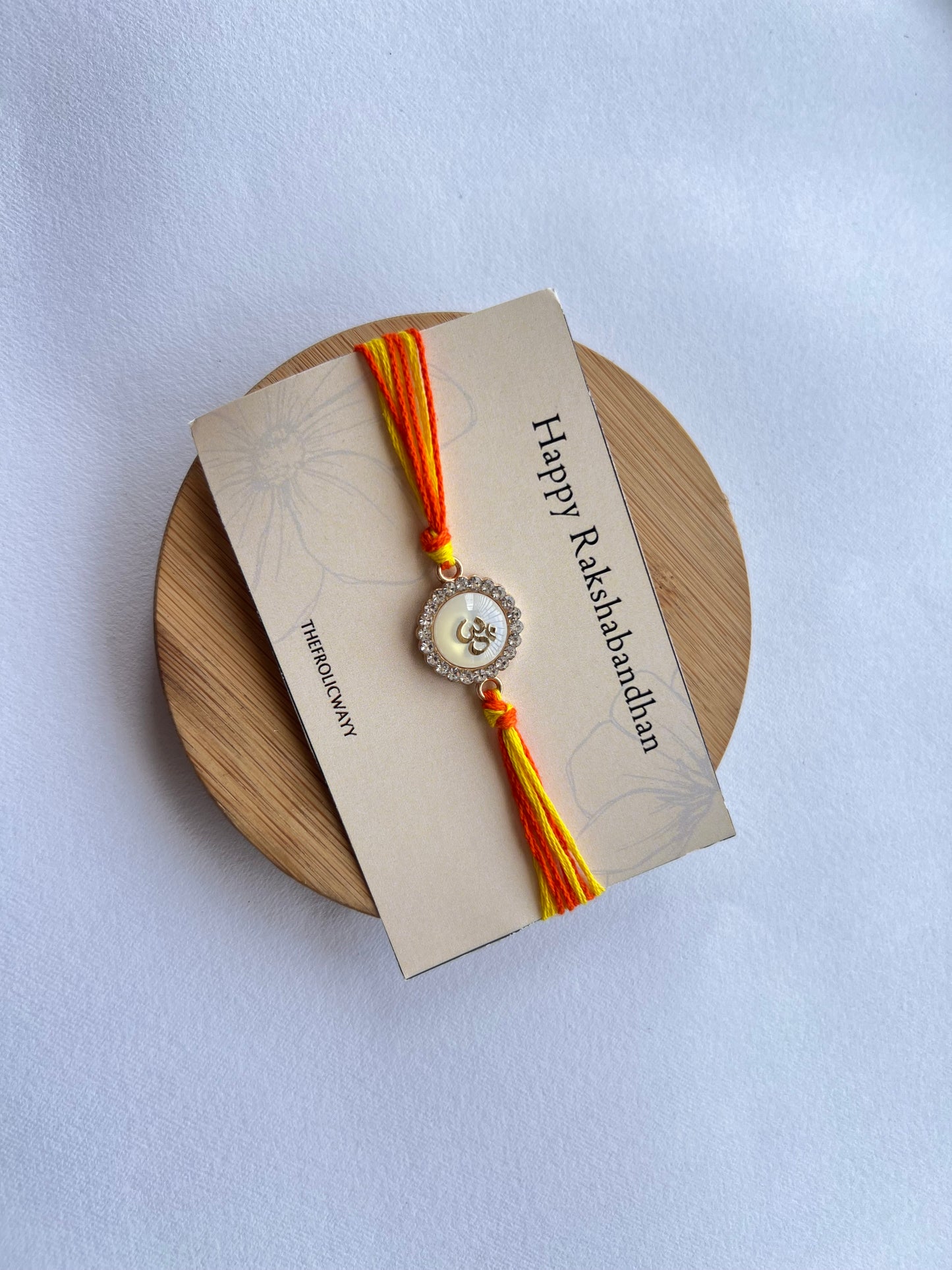 Orange Red Thread OM Rakhi