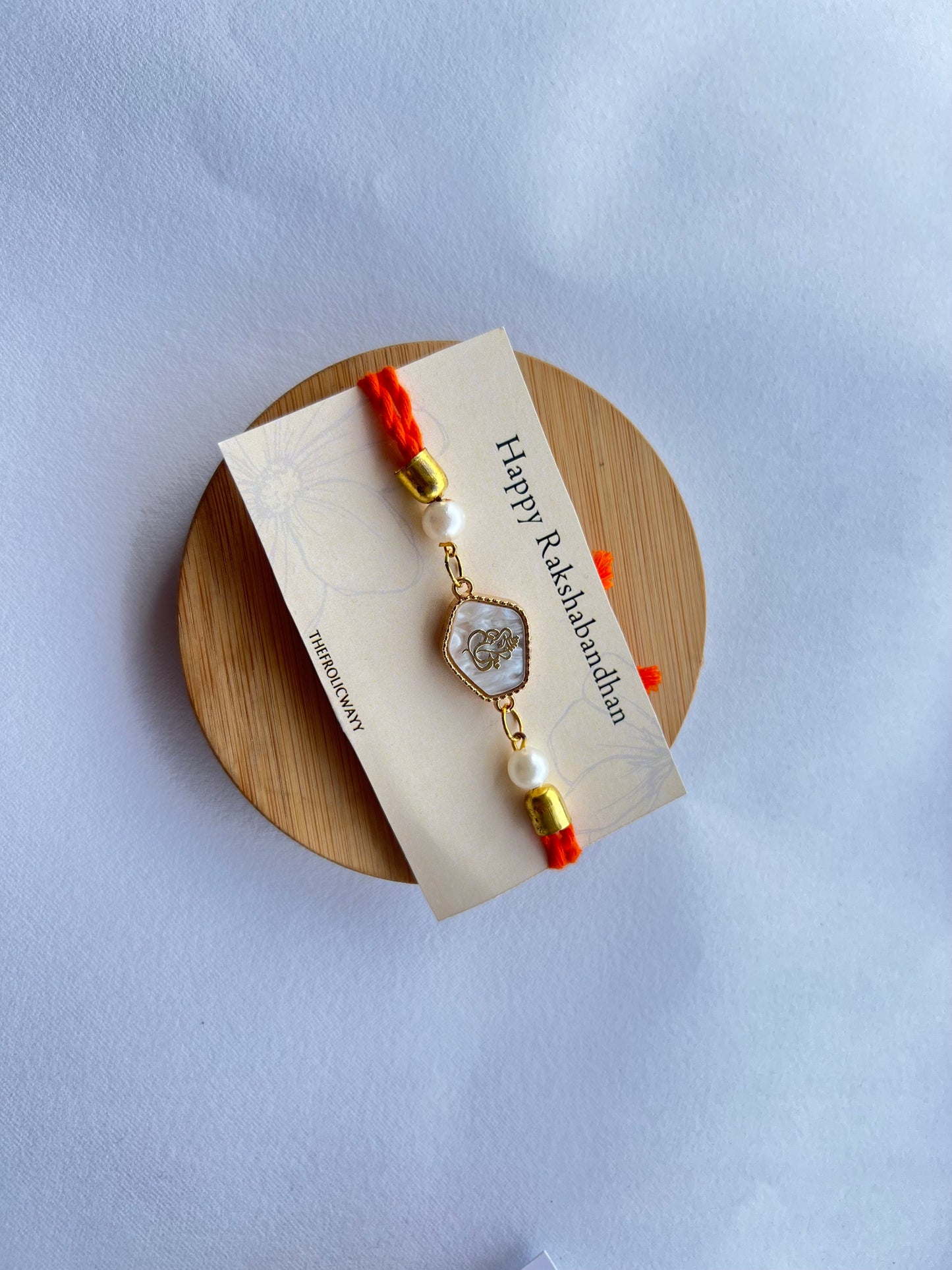 Orange Ganesha Adjustable Rakhi