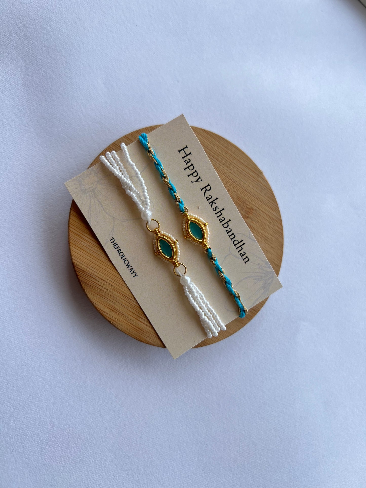 Turquoise Band Couple Rakhi